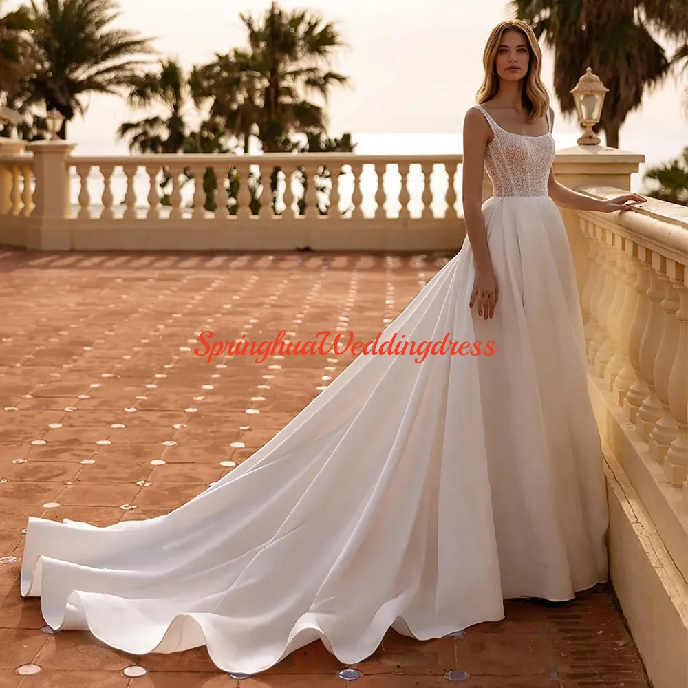 Customized Modern Wedding Dress for Woman Bride Robe De Mariee Scoop Neck Sleeveless Beading Sequined A Line Bridal Gownss
Customized Modern Wedding Dress for Woman Bride Robe De Mariee Scoop Neck Sleeveless Beading Sequined A Line Bridal Gownss