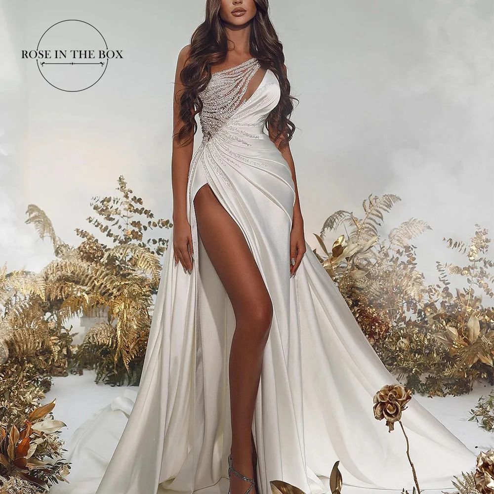 Sexy High Side Slit One Shoulder Evening Dresses 2025 Elegant Sequined Beaded Satin Formal Wedding Party Gowns Customized
Sexy High Side Slit One Shoulder Evening Dresses 2025 Elegant Sequined Beaded Satin Formal Wedding Party Gowns Customized