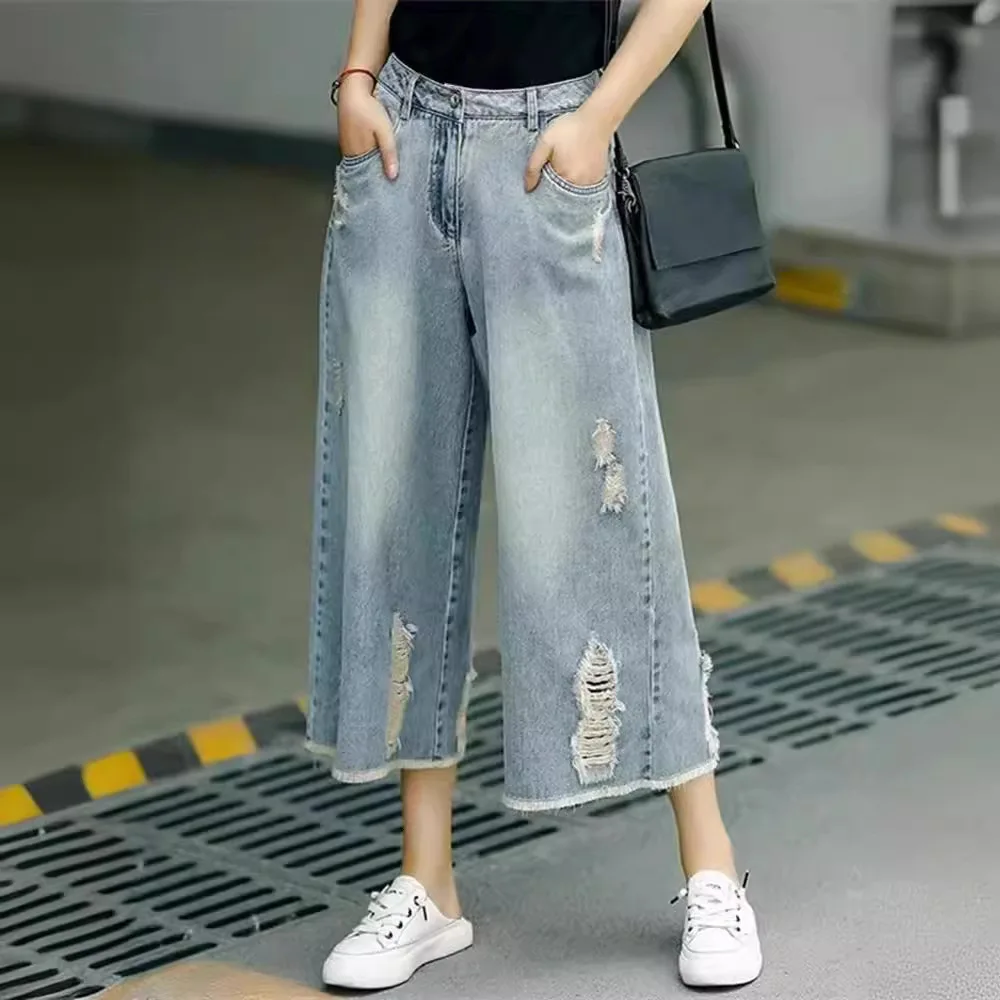 Women's Light Blue Ripped Denim Culottes, High Waist Wide Leg Cropped Jeans, Casual Frayed Hem Loose Fit Pants
Women's Light Blue Ripped Denim Culottes, High Waist Wide Leg Cropped Jeans, Casual Frayed Hem Loose Fit Pants
