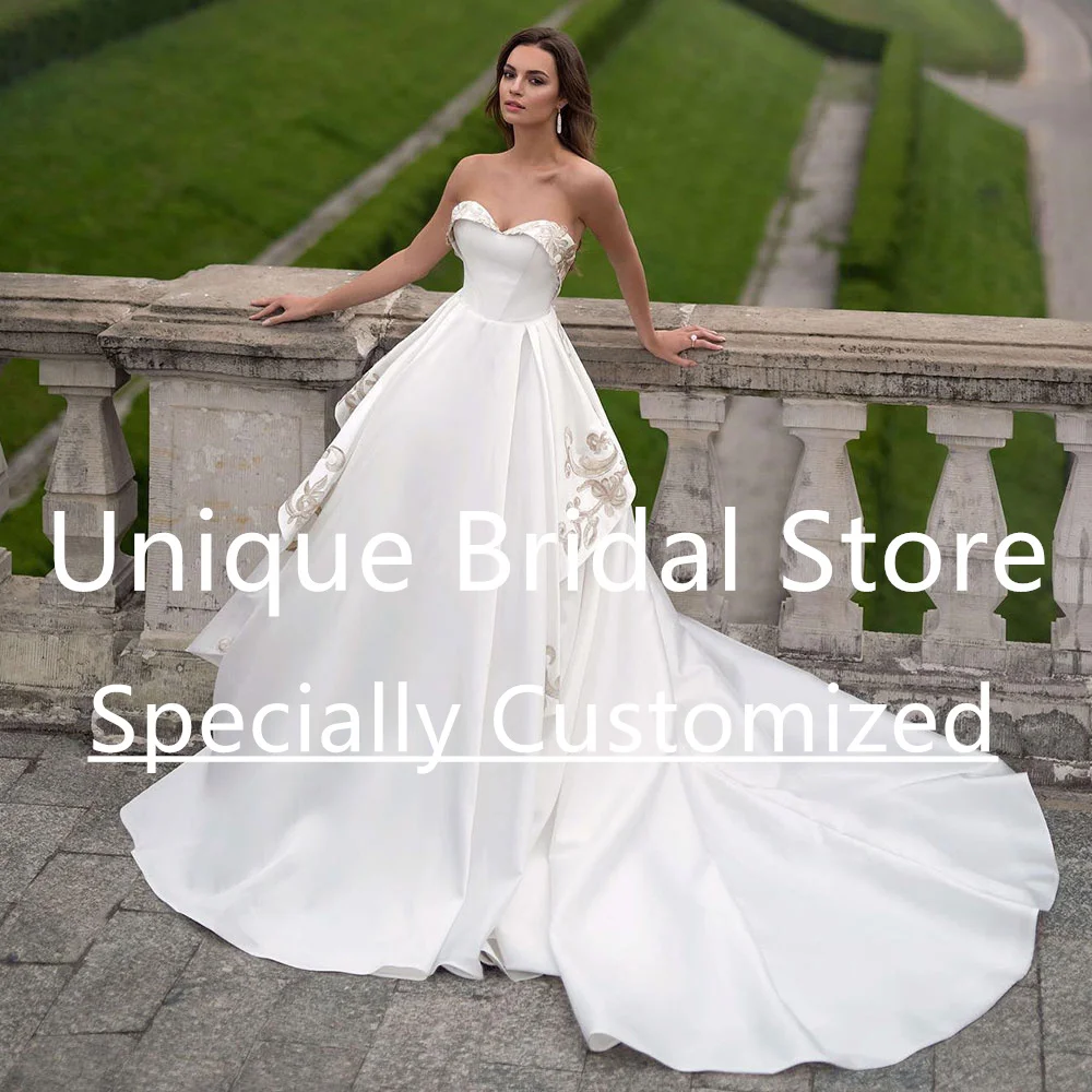 Customized Fashion Satin Wedding Dress A-Line Sweetheart Neck Applique Pleated Backless Ladies Elegant Court Train Vestido De No
Customized Fashion Satin Wedding Dress A-Line Sweetheart Neck Applique Pleated Backless Ladies Elegant Court Train Vestido De No