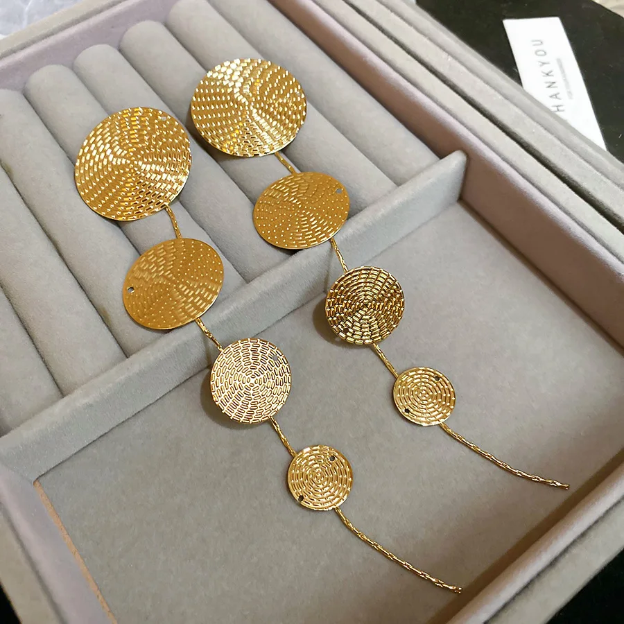 Silver needle metal round pattern long tassel earrings European and American simple and versatile earrings 
Silver needle metal round pattern long tassel earrings European and American simple and versatile earrings