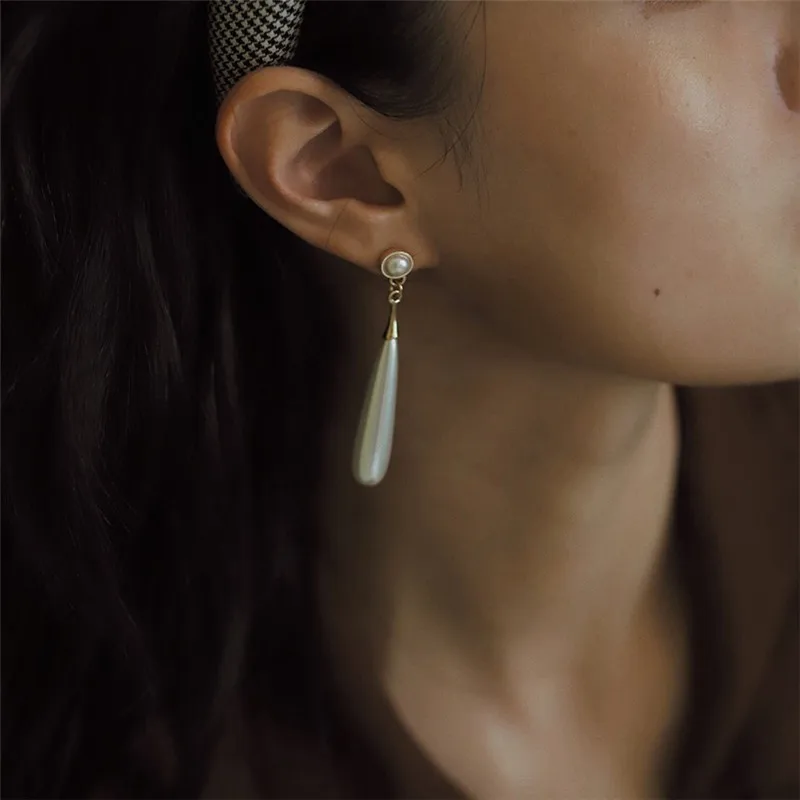 Pearl Pendant Earrings European And American Style Personalized Fashion Stud Earrings Ladies Girls Travel Wedding Accessories
Pearl Pendant Earrings European And American Style Personalized Fashion Stud Earrings Ladies Girls Travel Wedding Accessories