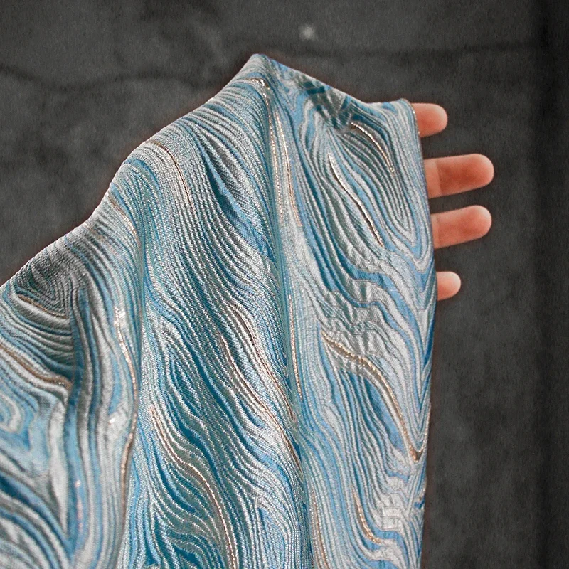 Three-dimensional Running Water Striped Blue and Silver Jacquard Texture Fabric Creative High-end Skirt Top Han Clothing Designe
Three-dimensional Running Water Striped Blue and Silver Jacquard Texture Fabric Creative High-end Skirt Top Han Clothing Designe