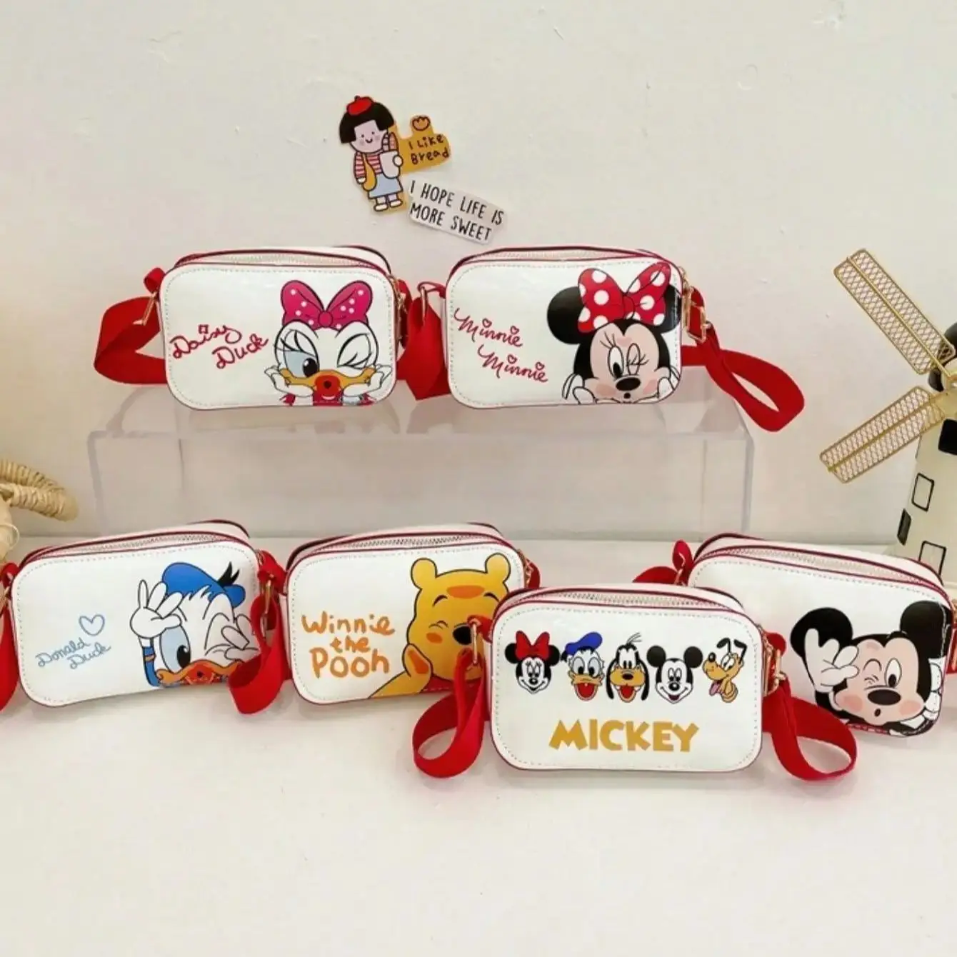 Disney Mickey and Minnie mobile phone bag is trendy and fashionable, fresh and sweet cartoon creativity, simple crossbody bag, f
Disney Mickey and Minnie mobile phone bag is trendy and fashionable, fresh and sweet cartoon creativity, simple crossbody bag, f