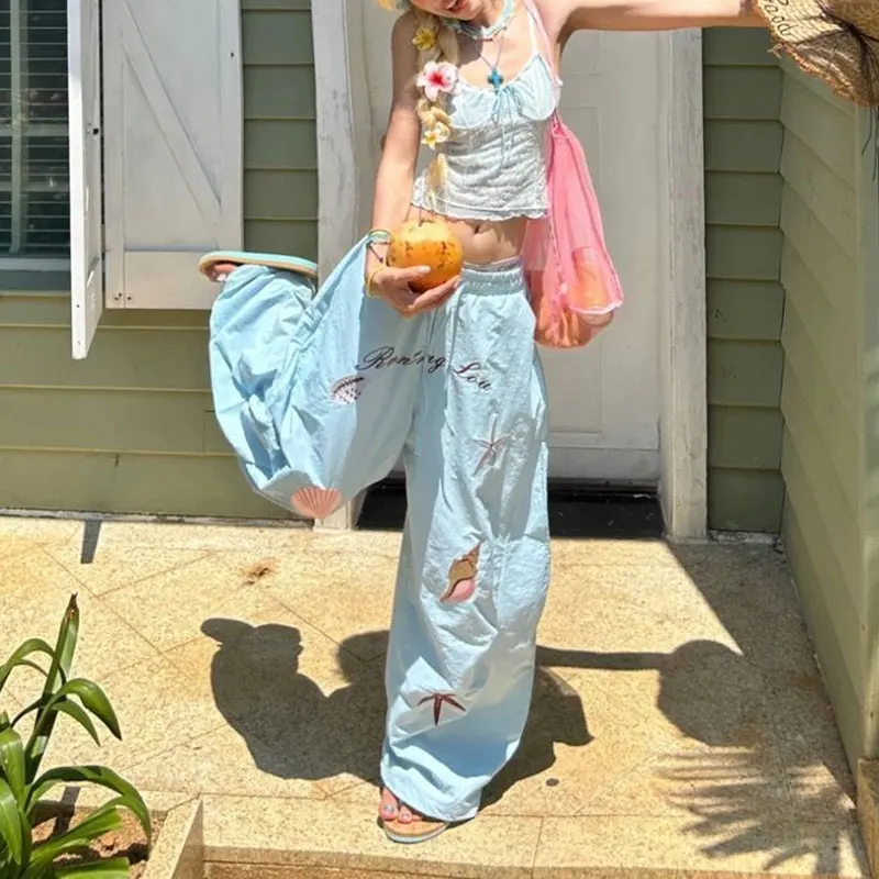 Women Light Blue Shell Starfish Embroidery Pants New Wide Leg Elastic Drawstring High Waist Loose Vacation Beach Casual Trousers
Women Light Blue Shell Starfish Embroidery Pants New Wide Leg Elastic Drawstring High Waist Loose Vacation Beach Casual Trousers