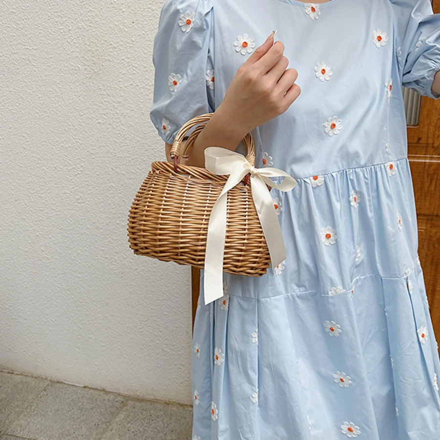Summer new rattan straw woven vegetable basket handbag hand-woven pearl handle beach bags vacation travel women's clutch purse
Summer new rattan straw woven vegetable basket handbag hand-woven pearl handle beach bags vacation travel women's clutch purse