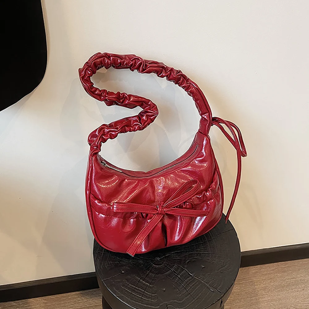 Женская модная глянцевая сумка на одно плечо с бантом и плиссировкой, мягкая, на молнии, однотонная, универсальная, подмышечная сумка, шикарная, многофункциональная сумка-мессенджер
Женская модная глянцевая сумка на одно плечо с бантом и плиссировкой, мягкая, на молнии, однотонная, универсальная, подмышечная сумка, шикарная, многофункциональная сумка-мессенджер