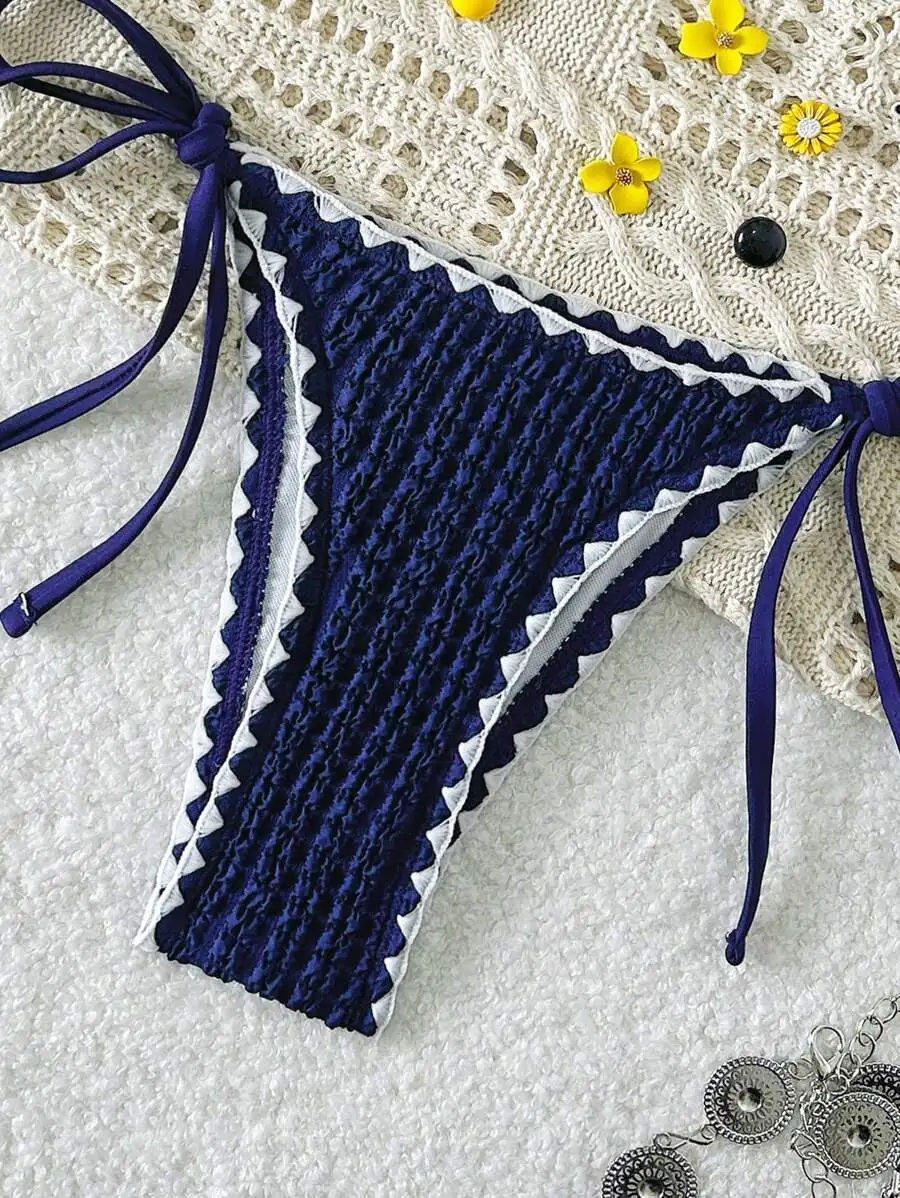 Womens Textured Solid Color Bikini Set With Side Tie Bottoms And Spaghetti Straps
Womens Textured Solid Color Bikini Set With Side Tie Bottoms And Spaghetti Straps