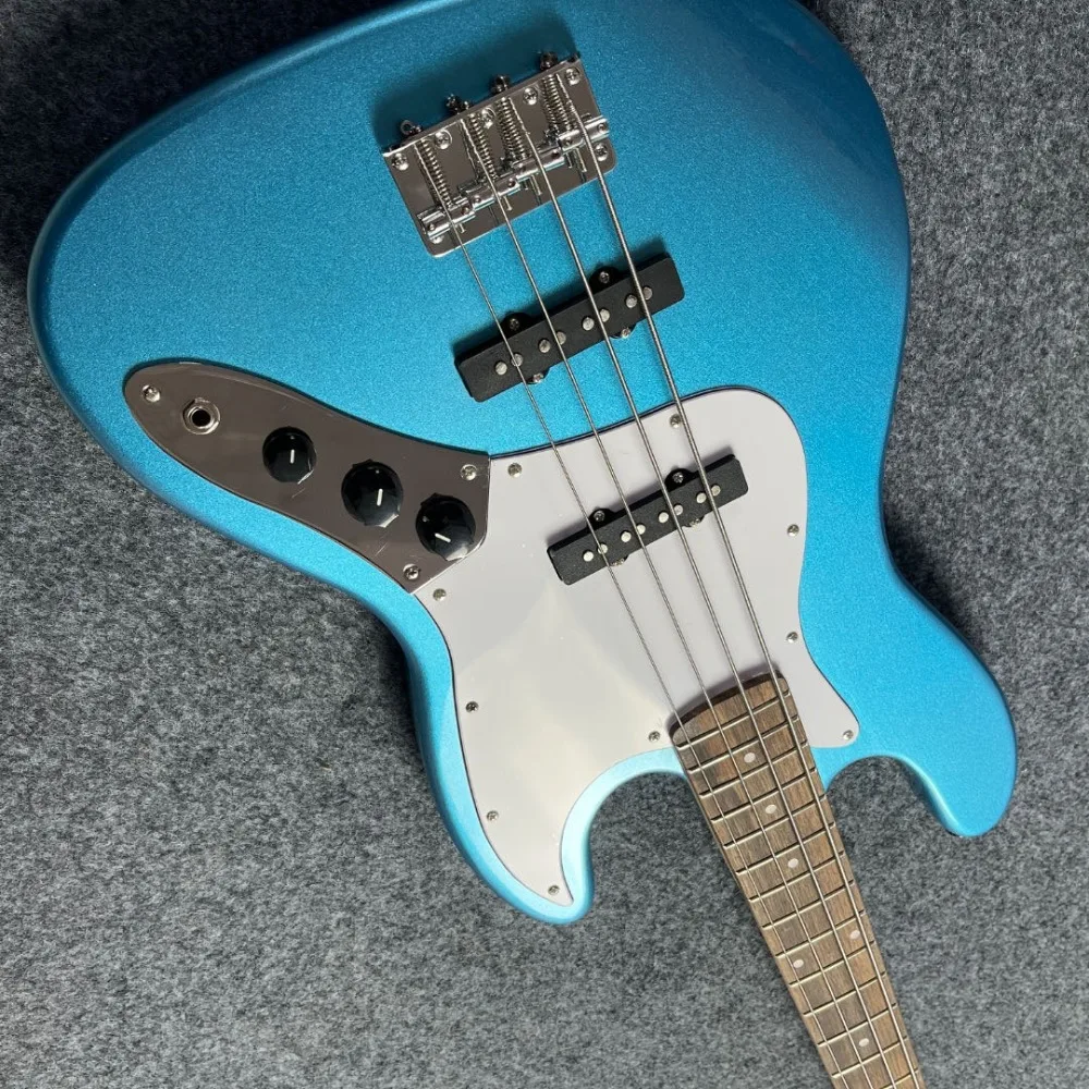 4 String Electric Guitar Blue Color with SS Pickups White Pickguards
4 String Electric Guitar Blue Color with SS Pickups White Pickguards