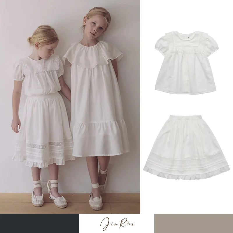 Girls' Doll Shirt Halter Set 2025 Summer New White Fashion Lace Edge Short Sleeve Tencel Cotton Casual Girls' Halter Dresses
Girls' Doll Shirt Halter Set 2025 Summer New White Fashion Lace Edge Short Sleeve Tencel Cotton Casual Girls' Halter Dresses