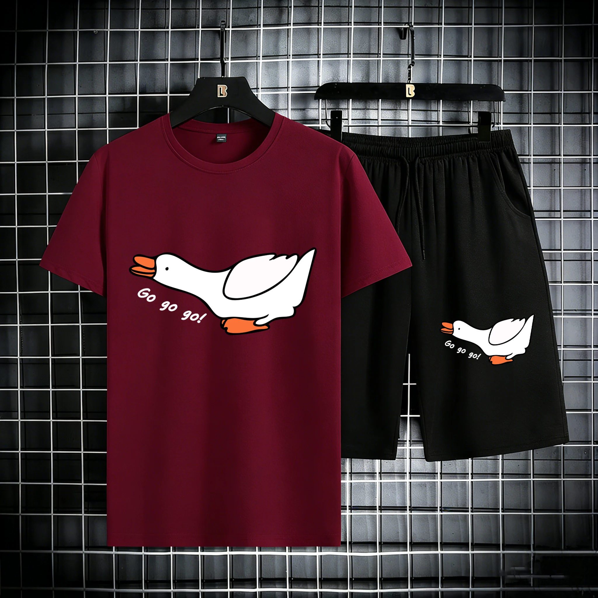Goose Charge Forward Print Cotton Loose Classic Man T Shirt Set Pocket Summer Shorts Breathable Street Clothes Casual Sportswear
Goose Charge Forward Print Cotton Loose Classic Man T Shirt Set Pocket Summer Shorts Breathable Street Clothes Casual Sportswear