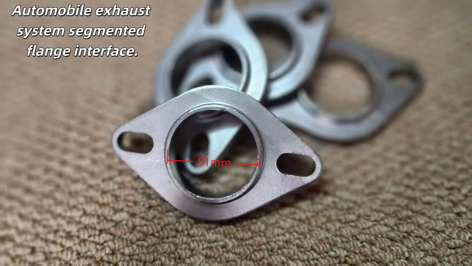 Automotive exhaust pipe interface flange.
Automotive exhaust pipe interface flange.