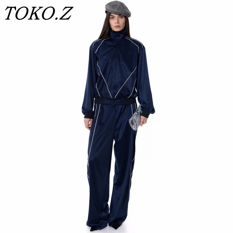 TOKO 2026 New Women 2 Piece Tracksuit Set High Neck Zip Up Contrast Piping Wide Leg Pants Satin Navy Blue Casual Outfit
TOKO 2026 New Women 2 Piece Tracksuit Set High Neck Zip Up Contrast Piping Wide Leg Pants Satin Navy Blue Casual Outfit