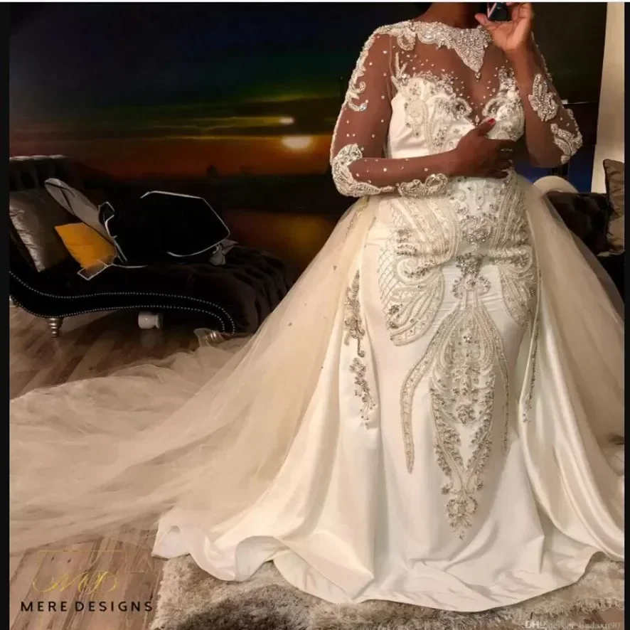Customized Embroidery Beads Mermaid Bridal Dresses Overskirt Illusion Long Sleeves Backless African Wedding Gowns For Bride
Customized Embroidery Beads Mermaid Bridal Dresses Overskirt Illusion Long Sleeves Backless African Wedding Gowns For Bride