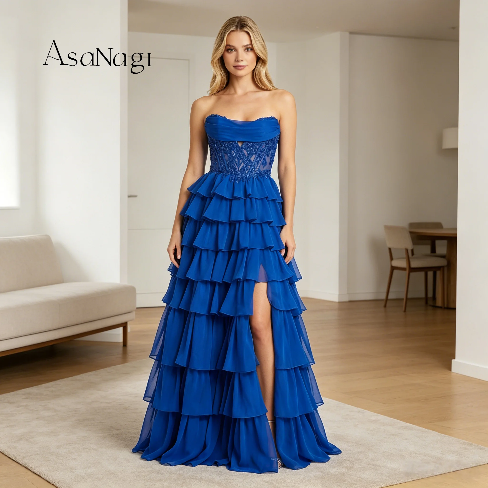 The bride wore a strapless, layered ruffled cake dress in a blue floor-length evening gown with exquisite beadwork.
The bride wore a strapless, layered ruffled cake dress in a blue floor-length evening gown with exquisite beadwork.