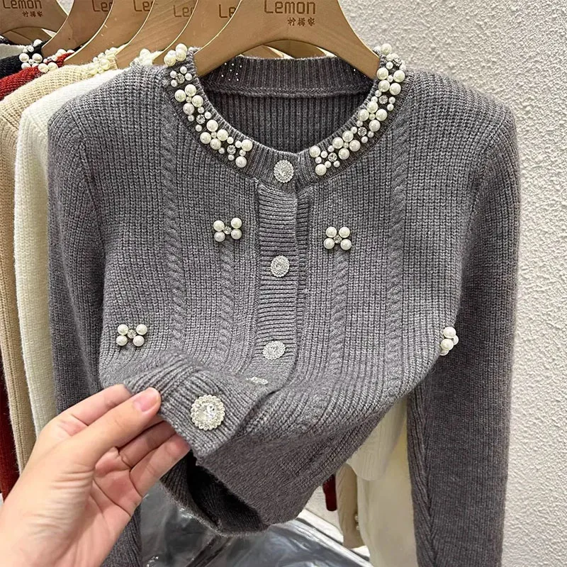 Модный вязаный свитер с длинным рукавом и бисером, женский пуловер с круглым вырезом, однотонный вязаный свитер, женские топы, свитеры для женщин Q2367
Модный вязаный свитер с длинным рукавом и бисером, женский пуловер с круглым вырезом, однотонный вязаный свитер, женские топы, свитеры для женщин Q2367