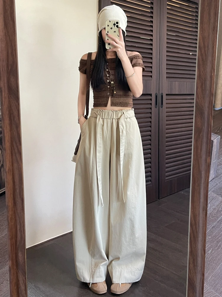 Solid color casual wide leg pants women in summer new thin style elastic waist loose drape floor hugging curved pants
Solid color casual wide leg pants women in summer new thin style elastic waist loose drape floor hugging curved pants