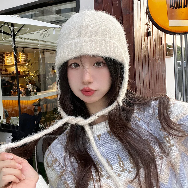 New winter blended ear protector Lei Feng hat outdoor warm men's and women's straps warm knitted flight bomber hats Gorras
New winter blended ear protector Lei Feng hat outdoor warm men's and women's straps warm knitted flight bomber hats Gorras