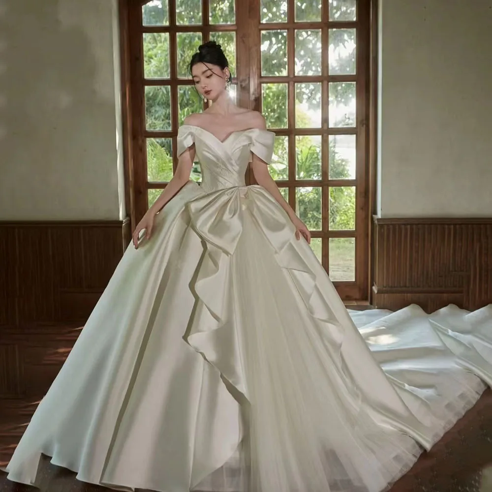 Exquisite Ball Gown Wedding Dress Off Shoulder Sleeveless Big Bowknot Bridal Gowns Custom Made High Quality Princess Dresses
Exquisite Ball Gown Wedding Dress Off Shoulder Sleeveless Big Bowknot Bridal Gowns Custom Made High Quality Princess Dresses