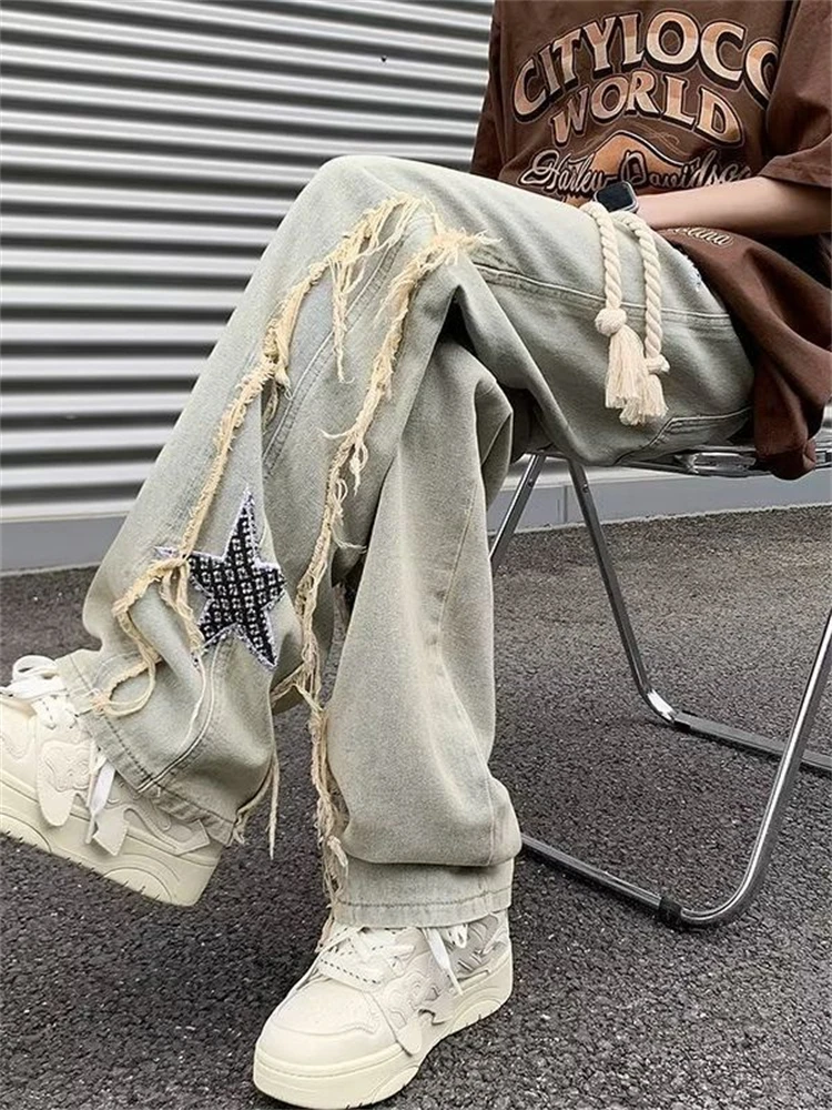 Star Patchwork Men Jeans Streetwear Retro Embroidered Tassel Straight Leg Loose Denim Trousers Male Drawstring Denim Baggy Pants
Star Patchwork Men Jeans Streetwear Retro Embroidered Tassel Straight Leg Loose Denim Trousers Male Drawstring Denim Baggy Pants
