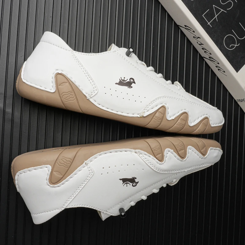Men's Sports and Leisure Shoes White Leather Flat Bottomed Student Walking Shoes Non Slip and Lightweight One Foot Tennis Shoes
Men's Sports and Leisure Shoes White Leather Flat Bottomed Student Walking Shoes Non Slip and Lightweight One Foot Tennis Shoes