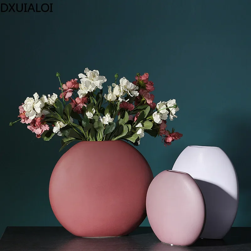 Nordic Creative Ceramic Crafts Flat Round Vase Ornaments flower vase home decoration Modern minimalist style stone vase
Nordic Creative Ceramic Crafts Flat Round Vase Ornaments flower vase home decoration Modern minimalist style stone vase
