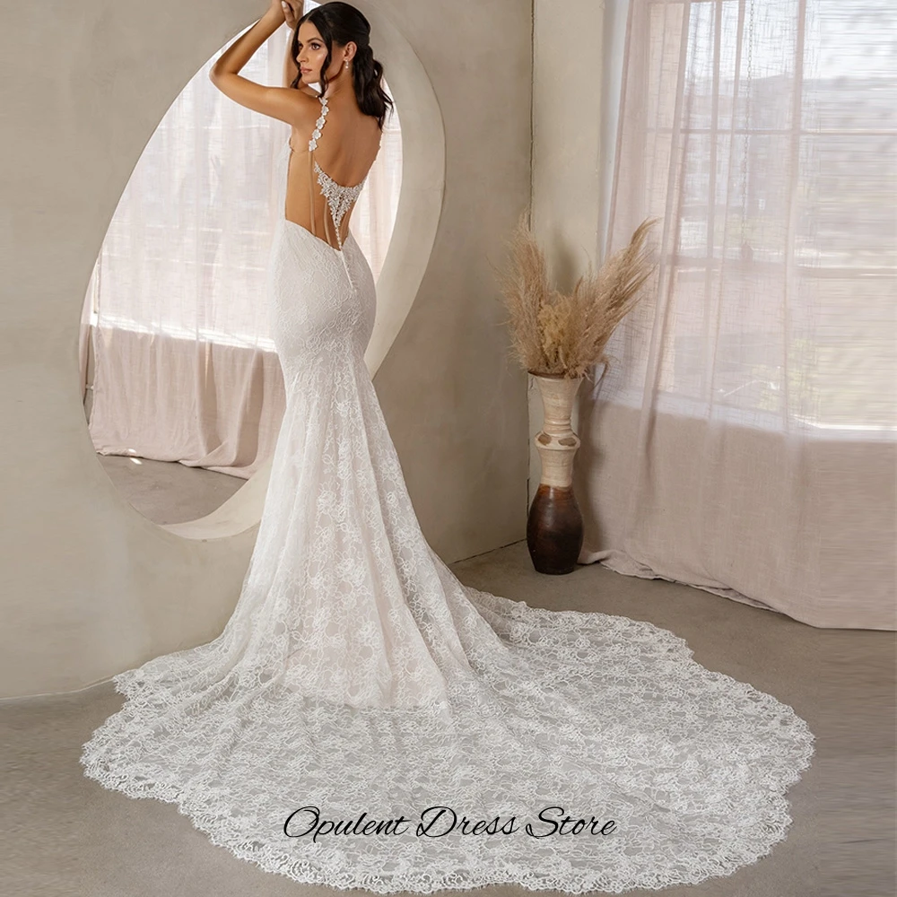 Exquisite Appliques Lace Customized Robe de mariée Mermaid Wedding Dress Spaghetti Straps Bridal Gowns with Buttons Back
Exquisite Appliques Lace Customized Robe de mariée Mermaid Wedding Dress Spaghetti Straps Bridal Gowns with Buttons Back