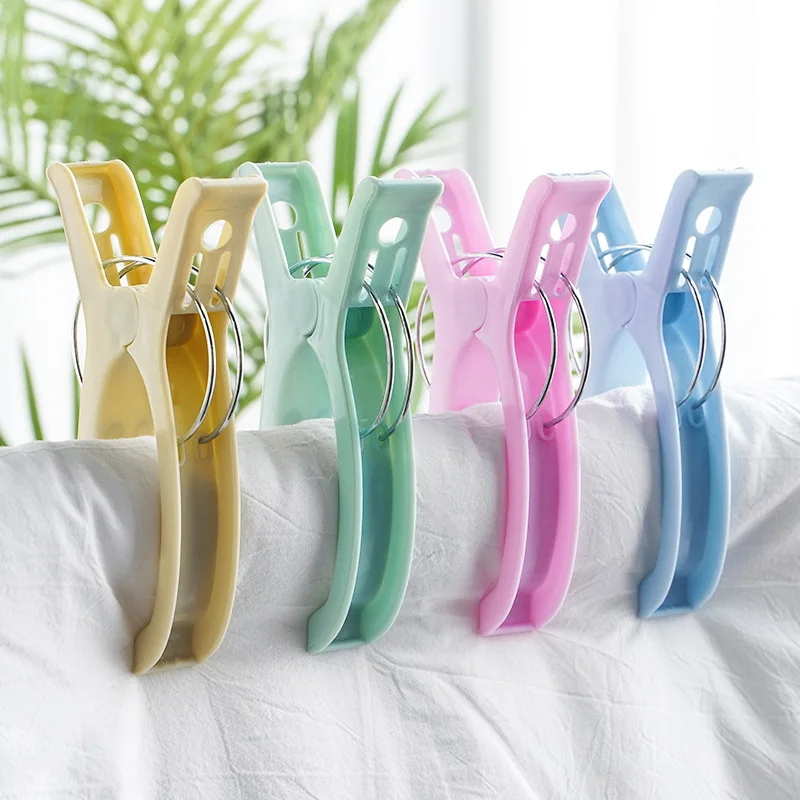 4Pcs Beach Towel Clips Large Clothes Clip Plastic Clothespin Clips Windproof Fixed Bed Sheet Clothes Pegs Home Wardrobe Storage
4Pcs Beach Towel Clips Large Clothes Clip Plastic Clothespin Clips Windproof Fixed Bed Sheet Clothes Pegs Home Wardrobe Storage