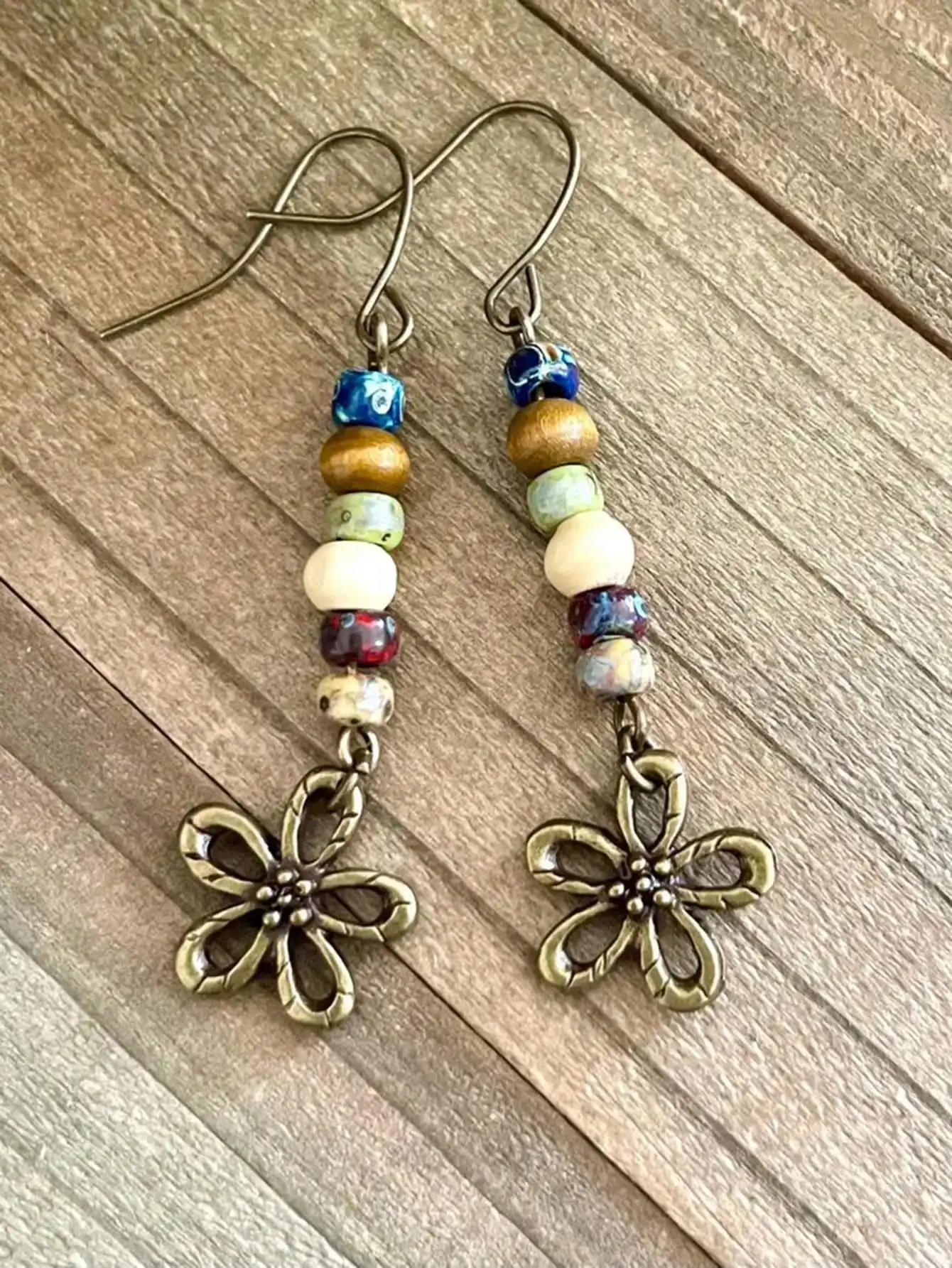 Серьги-подвески в стиле бохо с цветочным узором, разноцветными бусинами и металлическим кулоном под старину, женские повседневные украшения для вечеринок
Серьги-подвески в стиле бохо с цветочным узором, разноцветными бусинами и металлическим кулоном под старину, женские повседневные украшения для вечеринок