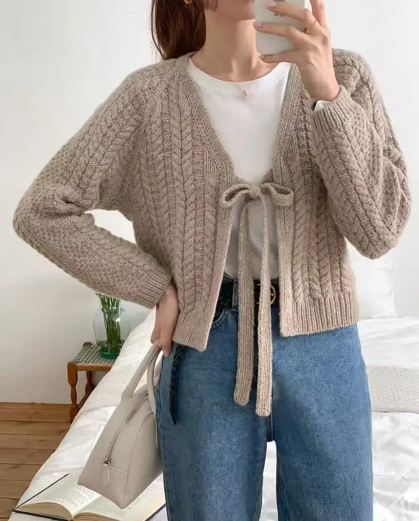 New fashionable and versatile casual style hollow out long sleeved knitted sunscreen cardigan for women, short style
New fashionable and versatile casual style hollow out long sleeved knitted sunscreen cardigan for women, short style