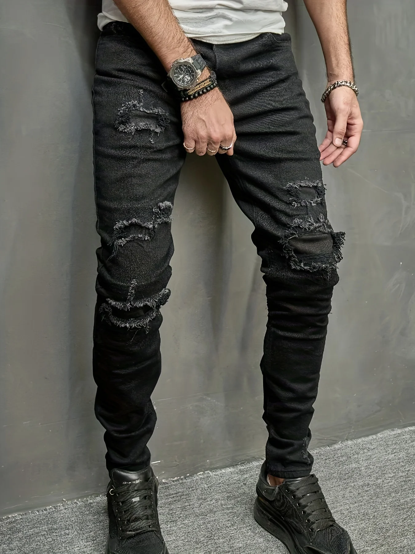 Men's slim fit jeans with torn holes, fabric patch, small feet, tight fitting denim pants
Men's slim fit jeans with torn holes, fabric patch, small feet, tight fitting denim pants
