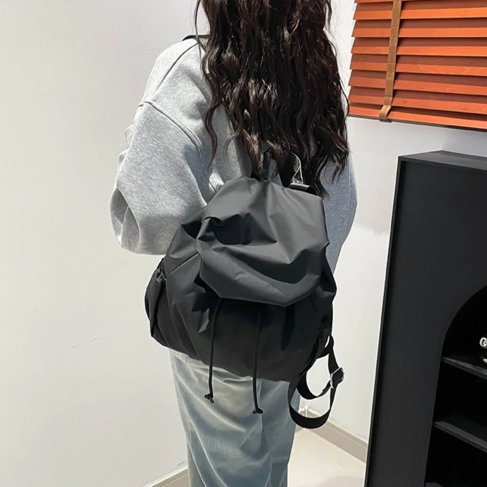 Solid Color Drawstring Backpack Pleated Flap Nylon Backpack Large Capacity Multi Functional Sports Shoulders Bag Outdoor
Solid Color Drawstring Backpack Pleated Flap Nylon Backpack Large Capacity Multi Functional Sports Shoulders Bag Outdoor
