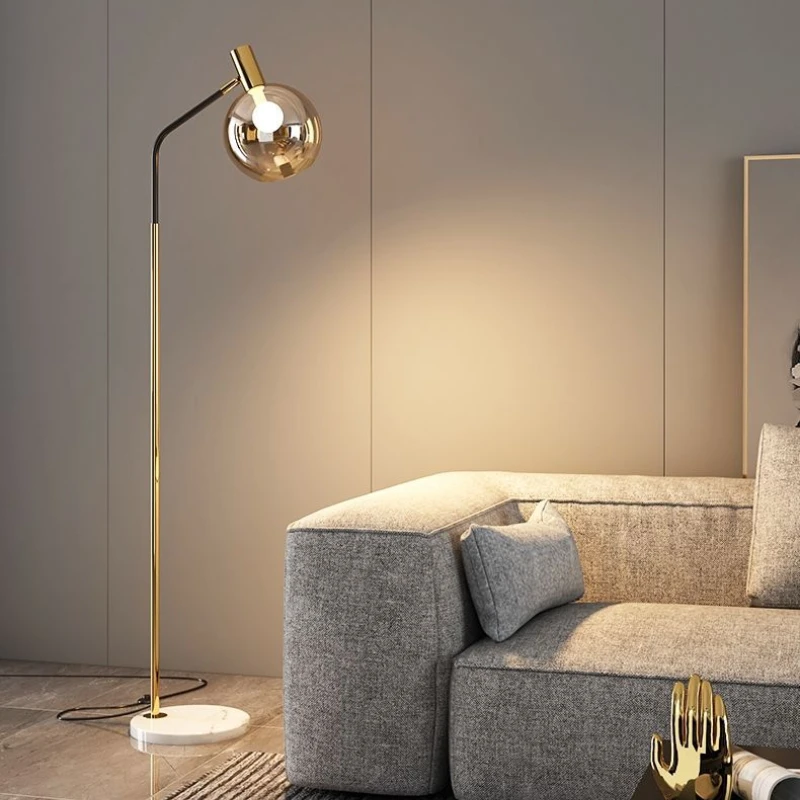 Итальянский дизайнерский напольный светильник с мраморным основанием и стеклянным плафоном для размещения рядом с диваном в гостиной, декоративный светильник для спальни, лампа для чтения.
Итальянский дизайнерский напольный светильник с мраморным основанием и стеклянным плафоном для размещения рядом с диваном в гостиной, декоративный светильник для спальни, лампа для чтения.