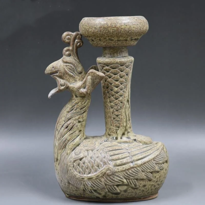 Yue kiln carved phoenix shaped candle holder oil lamp home desktop decoration antique porcelain decoration collection
Yue kiln carved phoenix shaped candle holder oil lamp home desktop decoration antique porcelain decoration collection