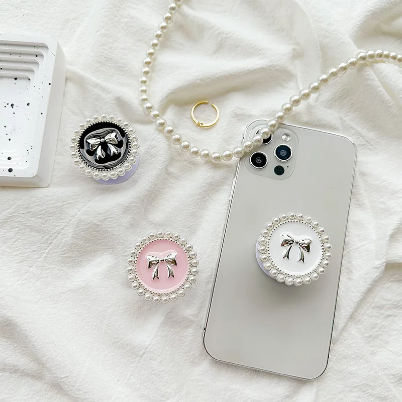 Корейская подставка-держатель для телефона с жемчужной окантовкой и бантом, на воздушной подушке, самоклеящаяся и выдвижная, для iPhone, Samsung S26, Grip Tok Bracket Holder
Корейская подставка-держатель для телефона с жемчужной окантовкой и бантом, на воздушной подушке, самоклеящаяся и выдвижная, для iPhone, Samsung S26, Grip Tok Bracket Holder