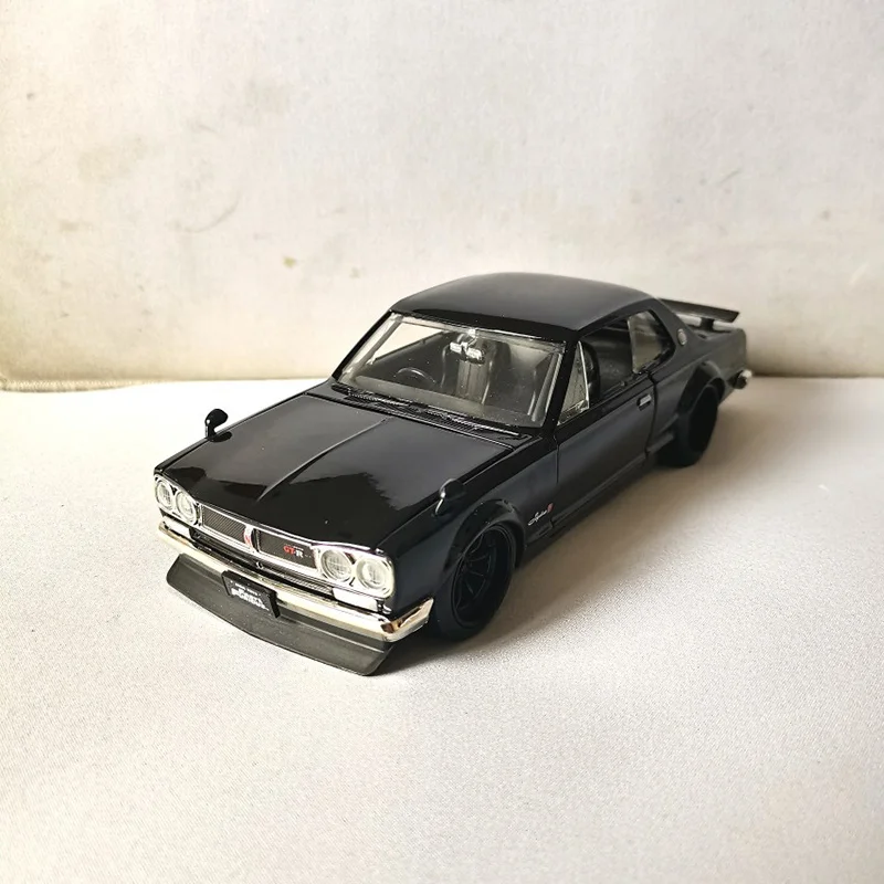 JADA масштаб 1:24 сплав Skyline 2000 GT-R KPGC10 литой под давлением миниатюрный игрушечный автомобиль моделирование классическая модель коллекционные сувениры дисплей
JADA масштаб 1:24 сплав Skyline 2000 GT-R KPGC10 литой под давлением миниатюрный игрушечный автомобиль моделирование классическая модель коллекционные сувениры дисплей