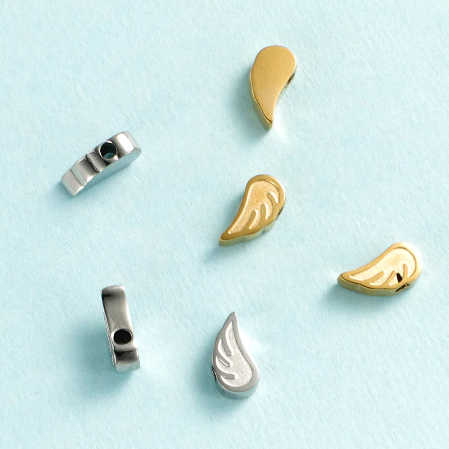 Stainless Steel Wings Bead Charms For DIY Jewelry Making Gold/Silver Color Metal Wings Bead Mirror Polished Wholesale 30pcs
Stainless Steel Wings Bead Charms For DIY Jewelry Making Gold/Silver Color Metal Wings Bead Mirror Polished Wholesale 30pcs