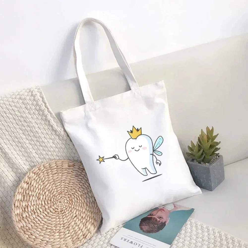 Cute Cartoon Tooth Fairy Canvas Tote Bag With Crown Magic Wand Print Soft Handbag For Daily Commute And Daily Use
Cute Cartoon Tooth Fairy Canvas Tote Bag With Crown Magic Wand Print Soft Handbag For Daily Commute And Daily Use