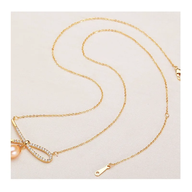 Pearl Jewelry Single-sided Bow Pendant Necklace Simple Gift Girlfriends Freshwater Pearl Necklace Women
Pearl Jewelry Single-sided Bow Pendant Necklace Simple Gift Girlfriends Freshwater Pearl Necklace Women