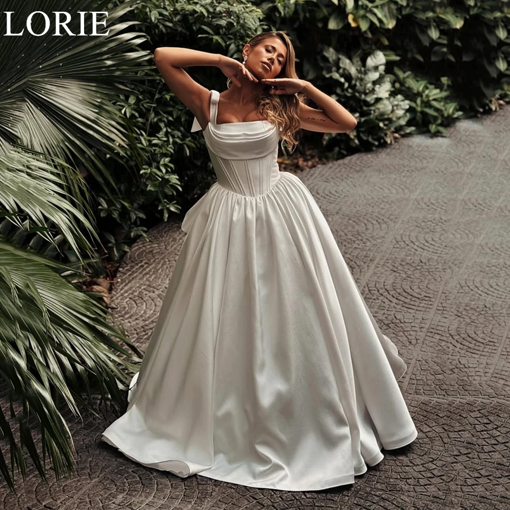 LORIE 2025 Ivory Satin Wedding Dress Elegant A-Line Spaghetti Strap Bridal Gowns Pleated Bow Draped Bride Prom Gowns Customized
LORIE 2025 Ivory Satin Wedding Dress Elegant A-Line Spaghetti Strap Bridal Gowns Pleated Bow Draped Bride Prom Gowns Customized