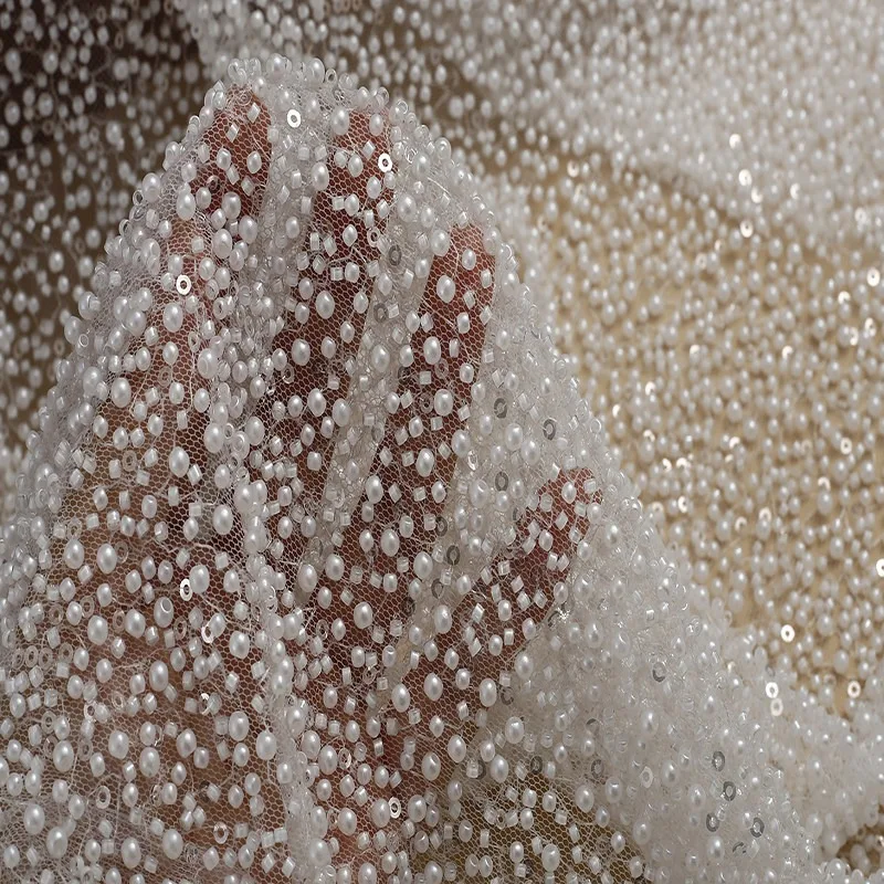 Top - grade Full - width Pearl - studded Beaded and Sequined Embroidered Tulle Cloth for Bridal and Evening Gowns Pearl Tulle
Top - grade Full - width Pearl - studded Beaded and Sequined Embroidered Tulle Cloth for Bridal and Evening Gowns Pearl Tulle