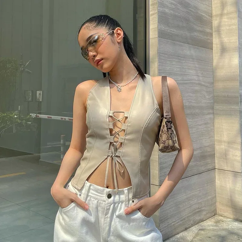 2024 New Y2K Streetwear Lace-Up PU Leather Vests Vintage Fashion V-neck Hollow Out Slit Sleeveless Crop Tops Summer Casual
2024 New Y2K Streetwear Lace-Up PU Leather Vests Vintage Fashion V-neck Hollow Out Slit Sleeveless Crop Tops Summer Casual