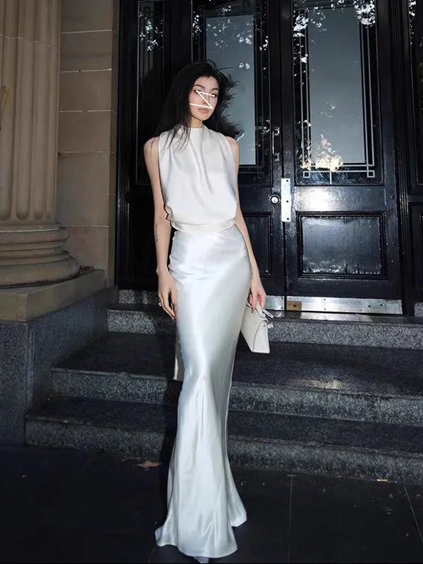 Elegant Satin Halter Neck Backless Short Vest High Waist Draped Fish Tail Midi Skirt Long Set Women's Fashion Spring Summer
Elegant Satin Halter Neck Backless Short Vest High Waist Draped Fish Tail Midi Skirt Long Set Women's Fashion Spring Summer