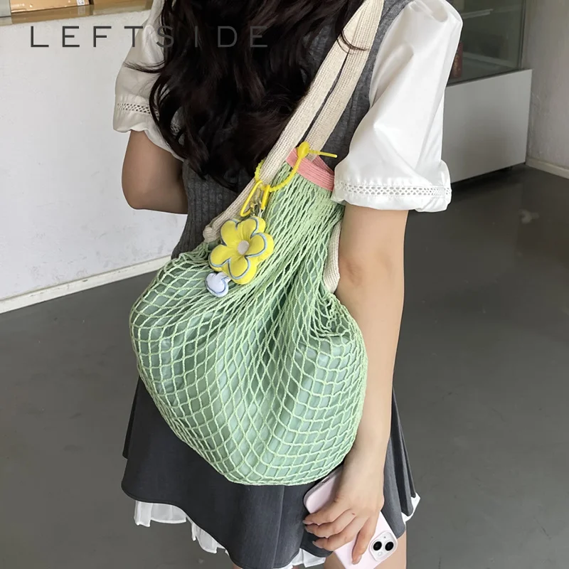 Summer 2026 Casual Net Knit Shoulder Bag Ladies Floral Pendant Large Beach large capacity Soft Travel Crossbody Tote Purse
Summer 2026 Casual Net Knit Shoulder Bag Ladies Floral Pendant Large Beach large capacity Soft Travel Crossbody Tote Purse