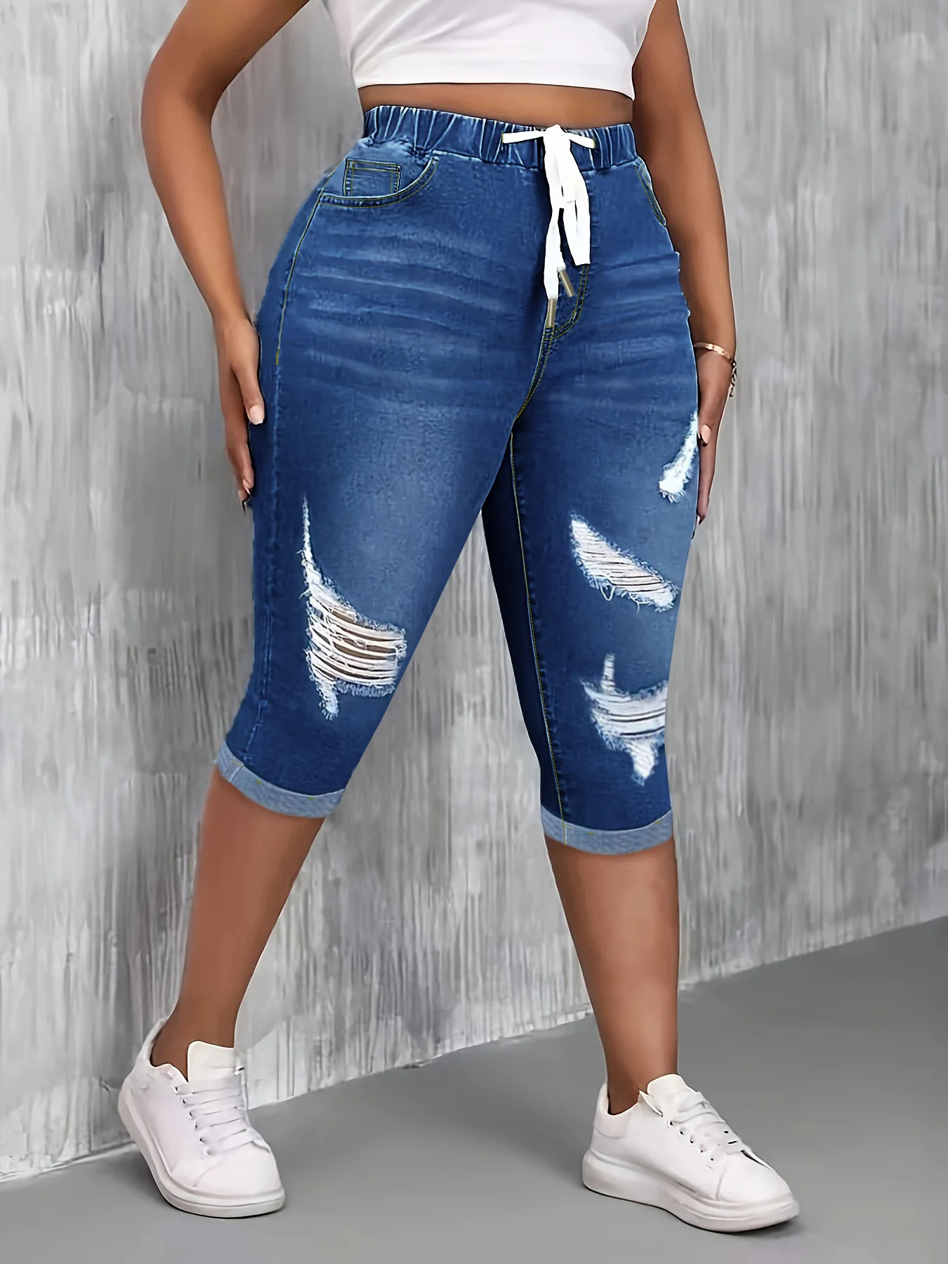 Women's Plus Size Blue Washed Ripped Denim Capri Pants, Drawstring Elastic Waist Stretchy Hip-Lifting Rolled Hem Daily Pants
Women's Plus Size Blue Washed Ripped Denim Capri Pants, Drawstring Elastic Waist Stretchy Hip-Lifting Rolled Hem Daily Pants