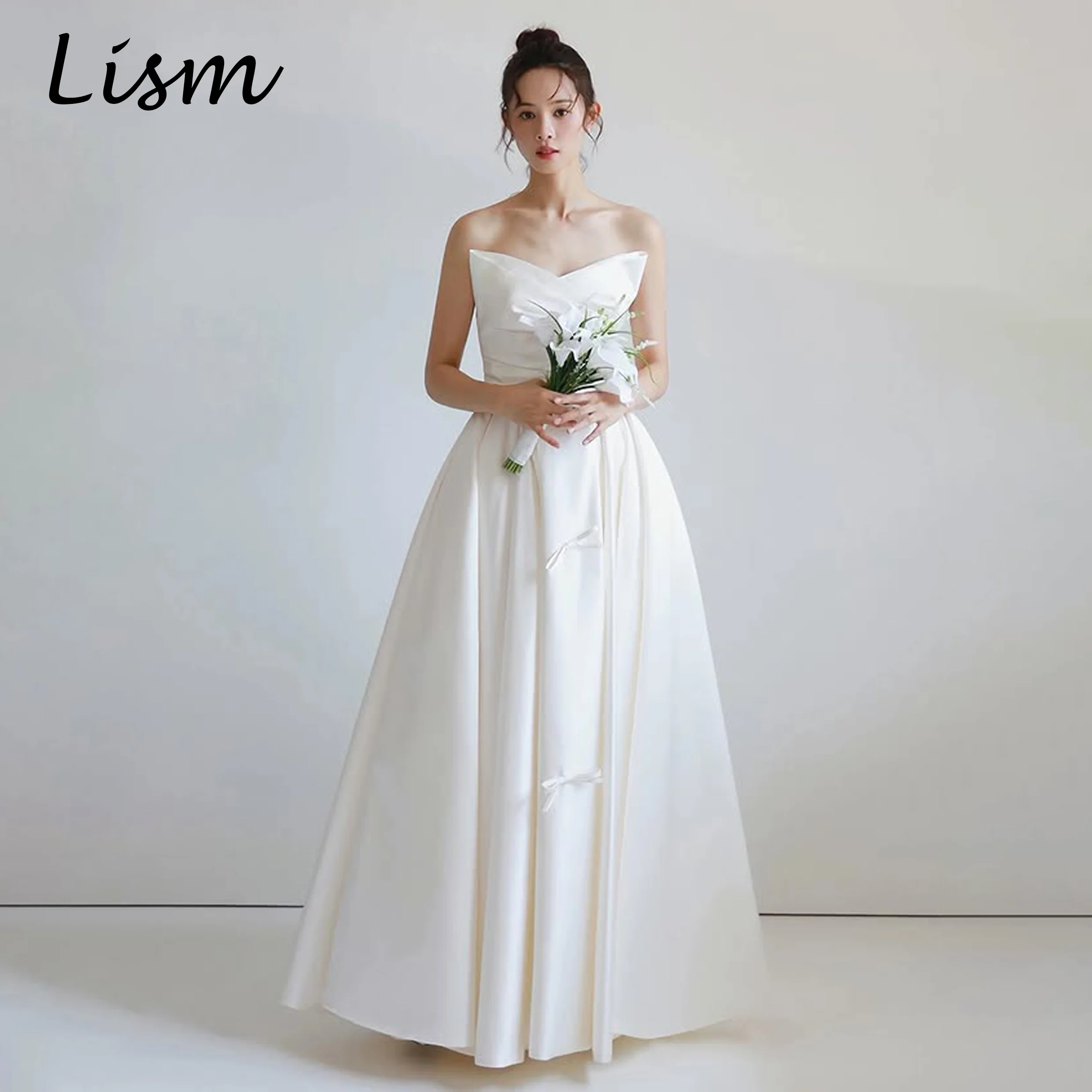 Lism Elegant Ivory Bow Wedding Party Dress Strapless Pleat A-Line Floor Length Satin Korea Photo Shoot Bridal Gown Customzied
Lism Elegant Ivory Bow Wedding Party Dress Strapless Pleat A-Line Floor Length Satin Korea Photo Shoot Bridal Gown Customzied
