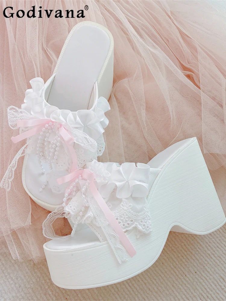 Japanese Original Lolita Sweet Girl White Wedge Slippers Elegant Girl Lace Bow Outside Wearing Cool Slippers
Japanese Original Lolita Sweet Girl White Wedge Slippers Elegant Girl Lace Bow Outside Wearing Cool Slippers