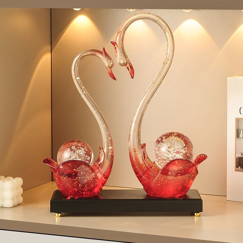 Swan ornament TV cabinet, living room display cabinet, light luxury high-end home decoration, wedding gifts for newlyweds
Swan ornament TV cabinet, living room display cabinet, light luxury high-end home decoration, wedding gifts for newlyweds