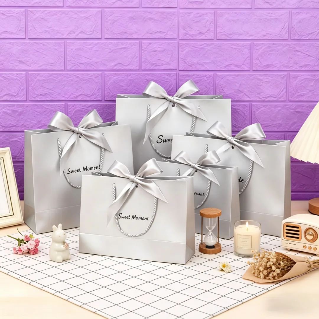 24Pack Silver Gray Paper Jewelry Gift Bag with Handles Bow Ribbon 28x20x10cm Thank You Favor Bag for Thanksgiving Wedding Box
24Pack Silver Gray Paper Jewelry Gift Bag with Handles Bow Ribbon 28x20x10cm Thank You Favor Bag for Thanksgiving Wedding Box