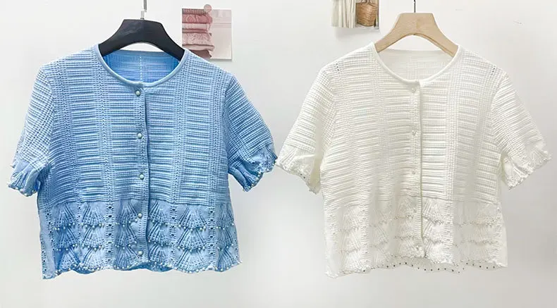 Women Short Sleeve Knit Cardigan Blue or White 2026 New Spring Summer Hollow Pattern Pearl Buckle Round Neck Short Sweater
Women Short Sleeve Knit Cardigan Blue or White 2026 New Spring Summer Hollow Pattern Pearl Buckle Round Neck Short Sweater